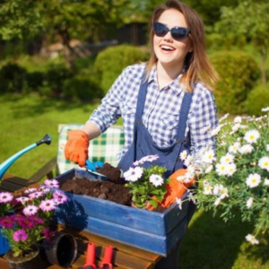 woman gardening outside while wearing UV sunglasses